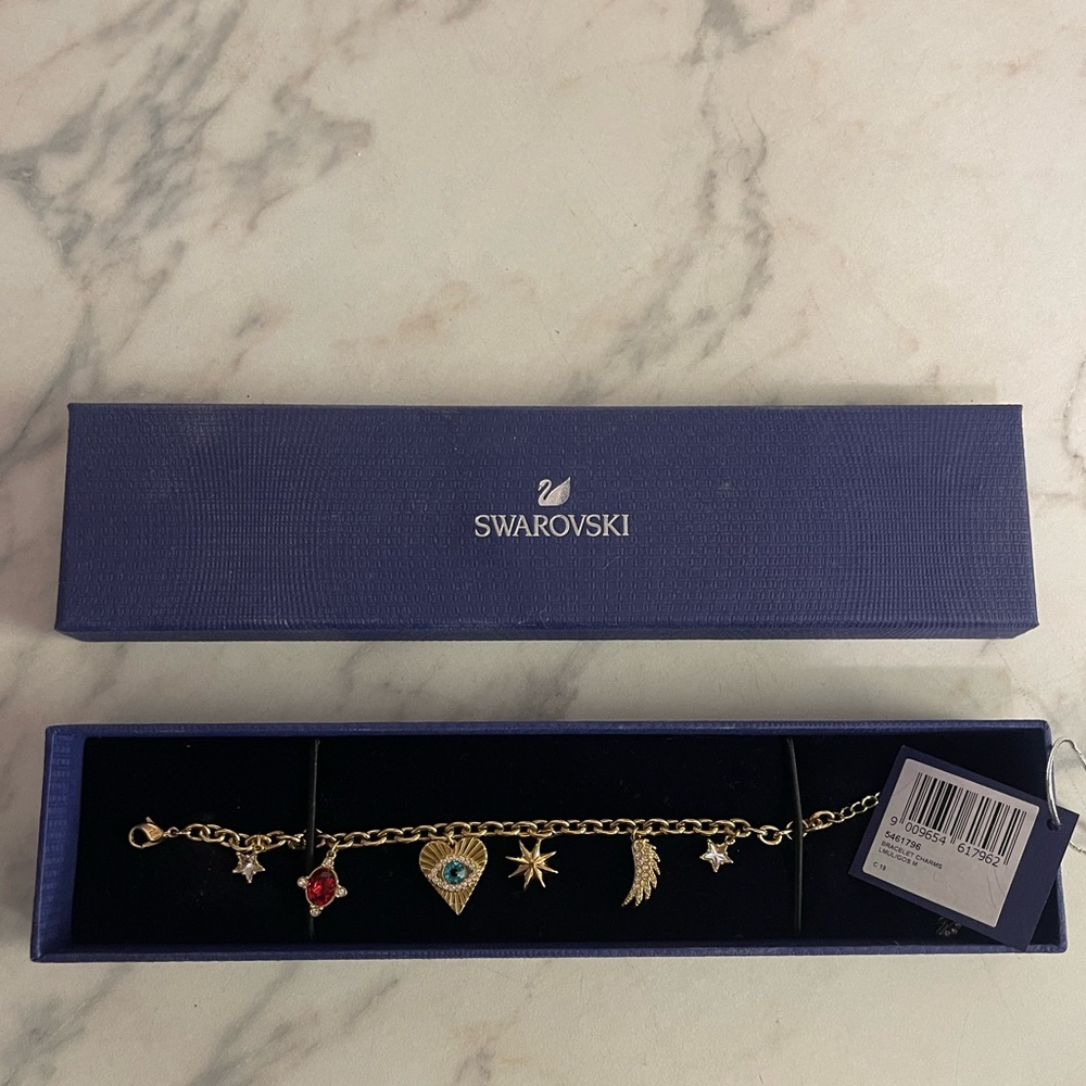 SWAROVSKI GOLD BRACELET WITH CHARMS